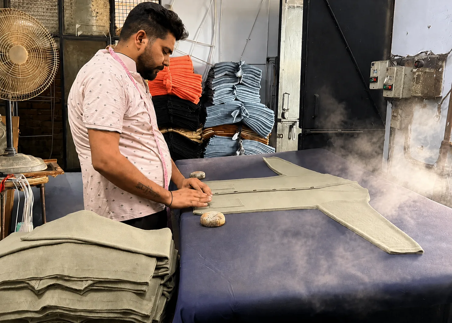 Steam pressing garments